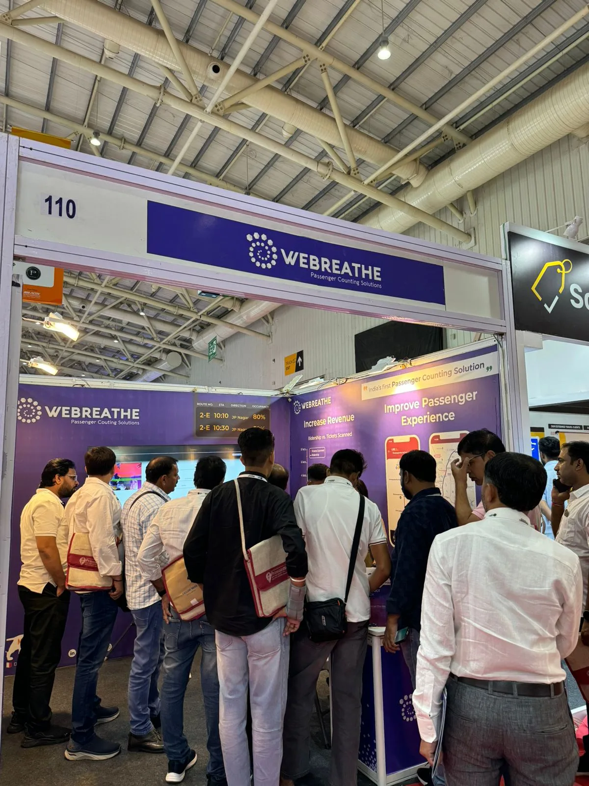 Visitors gathered outside WEBREATHE Booth 110