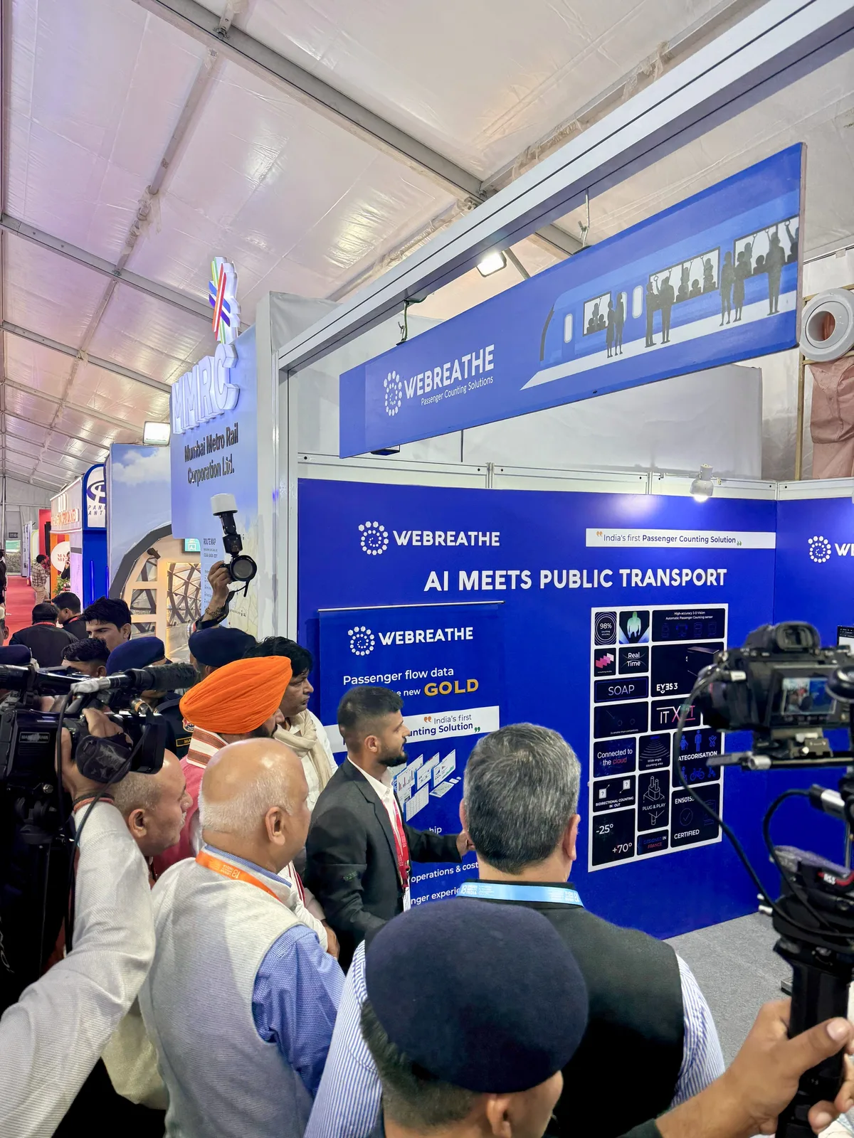 Media gathered around the WEBREATHE booth